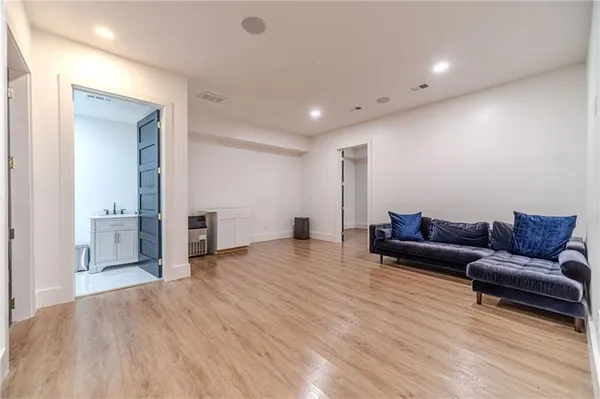 a view of a house with sitting area and garden