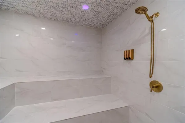 a view of a lake with outdoor seating