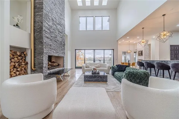 a living room with furniture fireplace and a fireplace