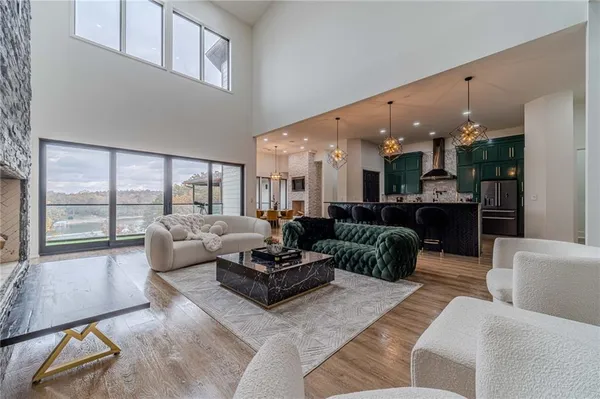 a large kitchen with a table and chairs