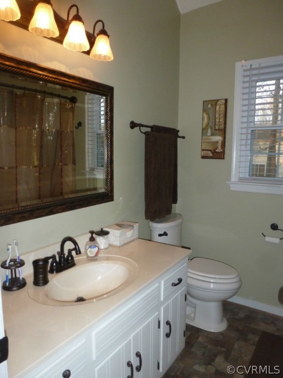 14806 Acorn Ridge Road Midlothian, VA 23112 - Photo 11 of 24 a bathroom with a granite countertop toilet sink and mirror