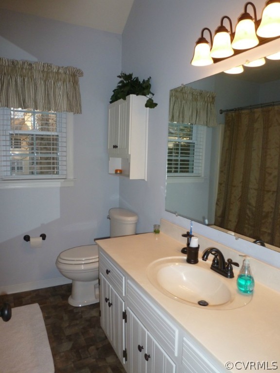 14806 Acorn Ridge Road Midlothian, VA 23112 - Photo 14 of 24 a bathroom with a sink toilet and a mirror