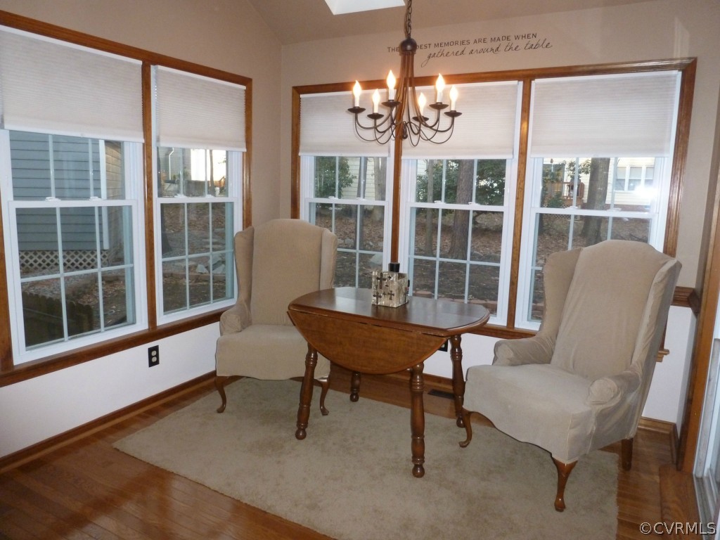 14806 Acorn Ridge Road Midlothian, VA 23112 - Photo 8 of 24 a view of a room with furniture wooden floor and windows