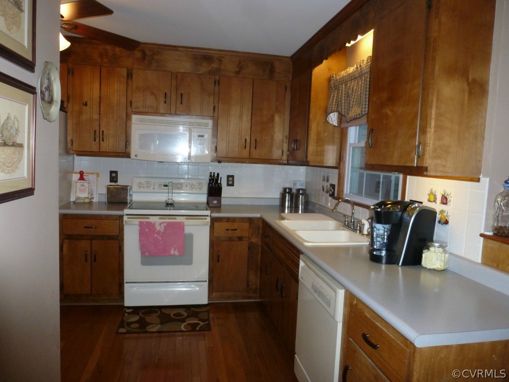 14806 Acorn Ridge Road Midlothian, VA 23112 - Photo 9 of 24 a kitchen with a sink stove and cabinets