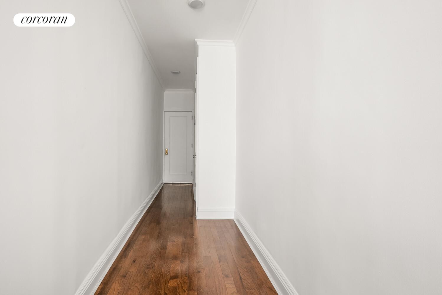 24-51 38th Street, Unit B7 Queens, NY 11103 - Photo 5 of 13 a view of hallway with wooden floor