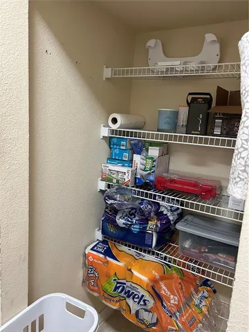 a room with storage and utility