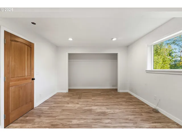 a view of bathroom with washer and dryer