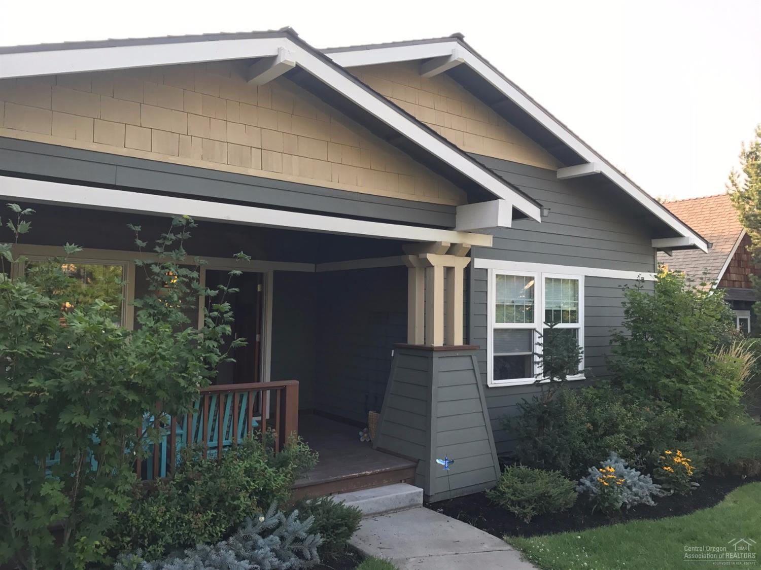 2422 Northwest Awbrey Road Bend, OR 97703 - Photo 2 of 21 a front view of a house with garden