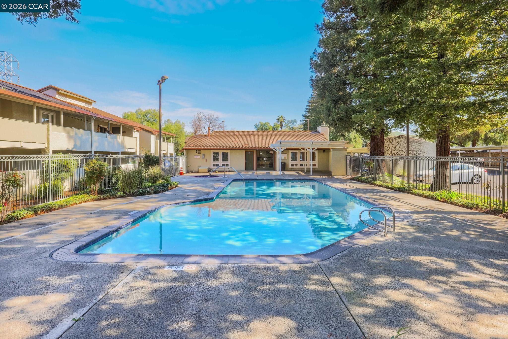 1505 Kirker Pass Road, Unit 164 Concord, CA 94521 - Photo 13 of 29 a view of a house with a yard