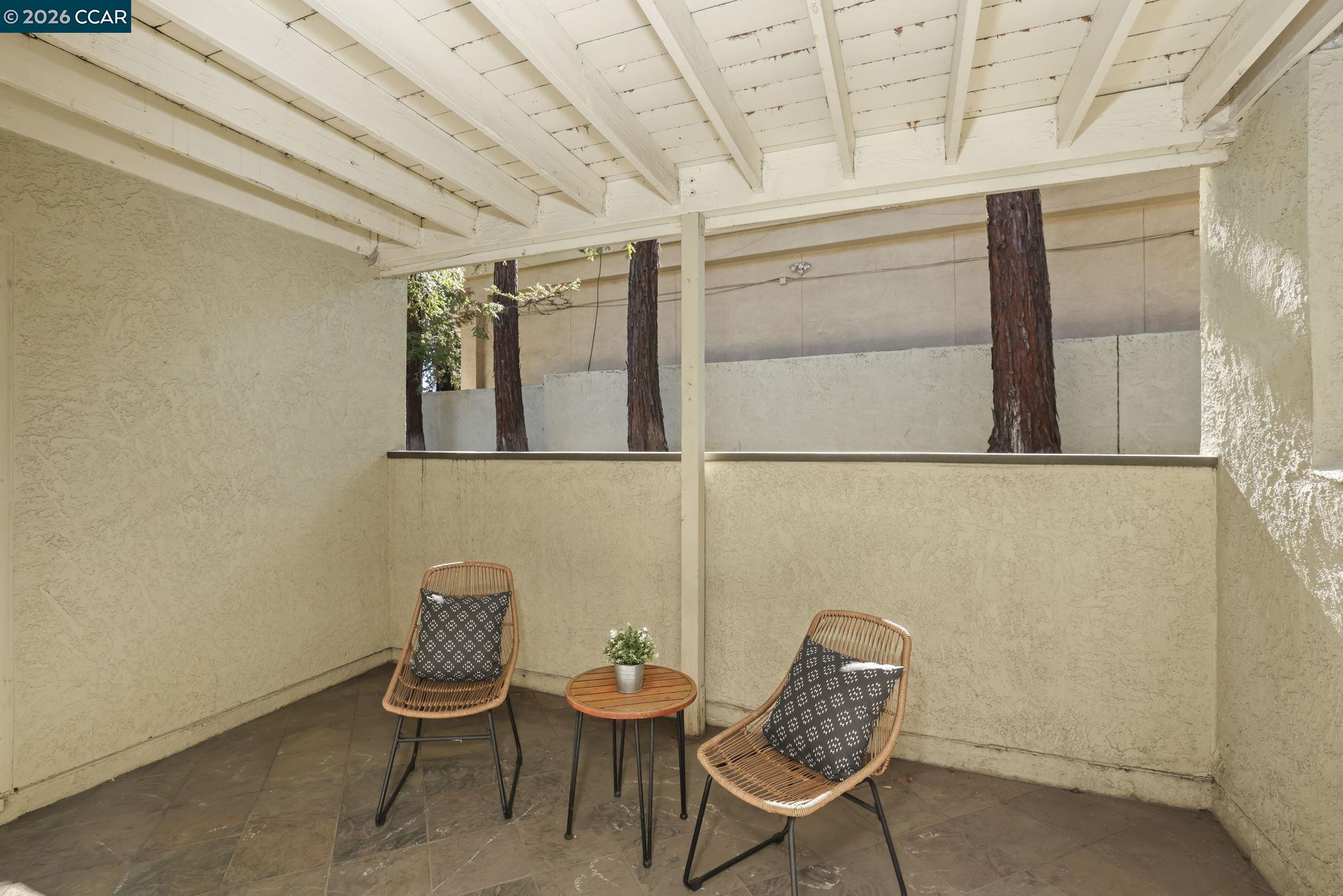 1505 Kirker Pass Road, Unit 164 Concord, CA 94521 - Photo 3 of 29 a chair and a table in a room