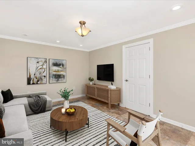 a view of balcony with furniture and wooden floor