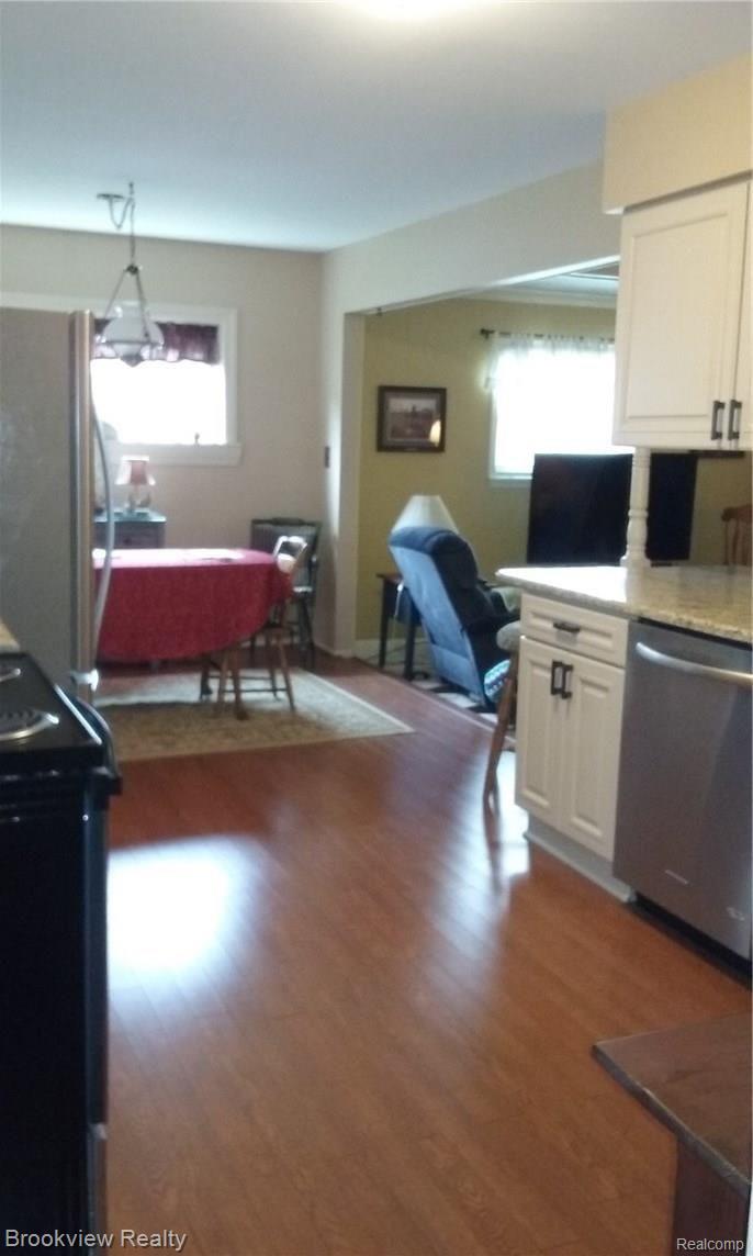 14148 Merriman Road Livonia, MI 48154 - Photo 27 of 61 Large kitchen, opens into dining area and family room.