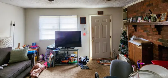 a room with furniture and fireplace