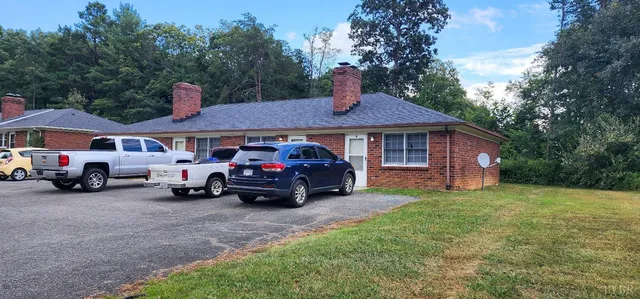 a view of a car in front of house