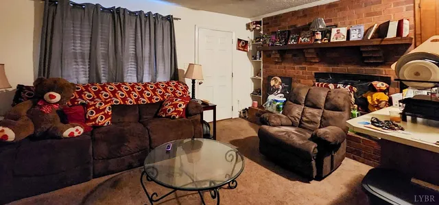 a bedroom with furniture and a flat screen tv