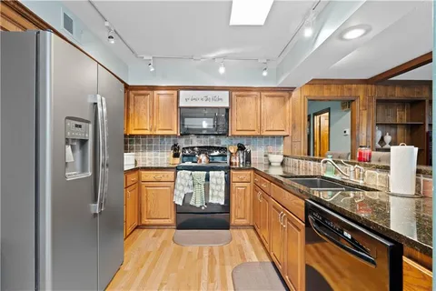 $680,000 | 7447 Black Oak Circle, Stilwell, KS 66085