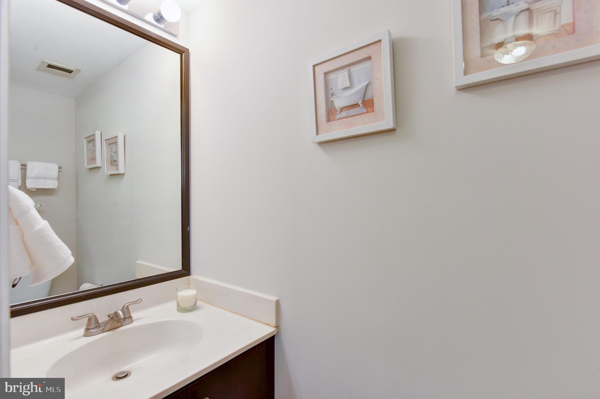 545 East Braddock Road, Unit 201 Alexandria, VA 22314 - Photo 21 of 32 Half Bath for Guests in the Hallway