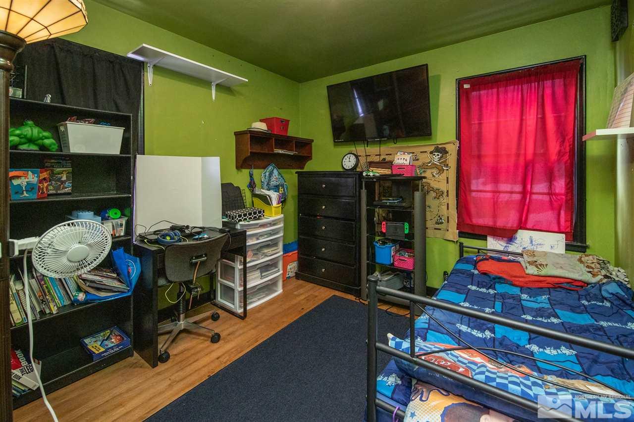 710 Balzar Circle Reno, NV 89502 - Photo 20 of 23 a room with musical instruments and air hockey table