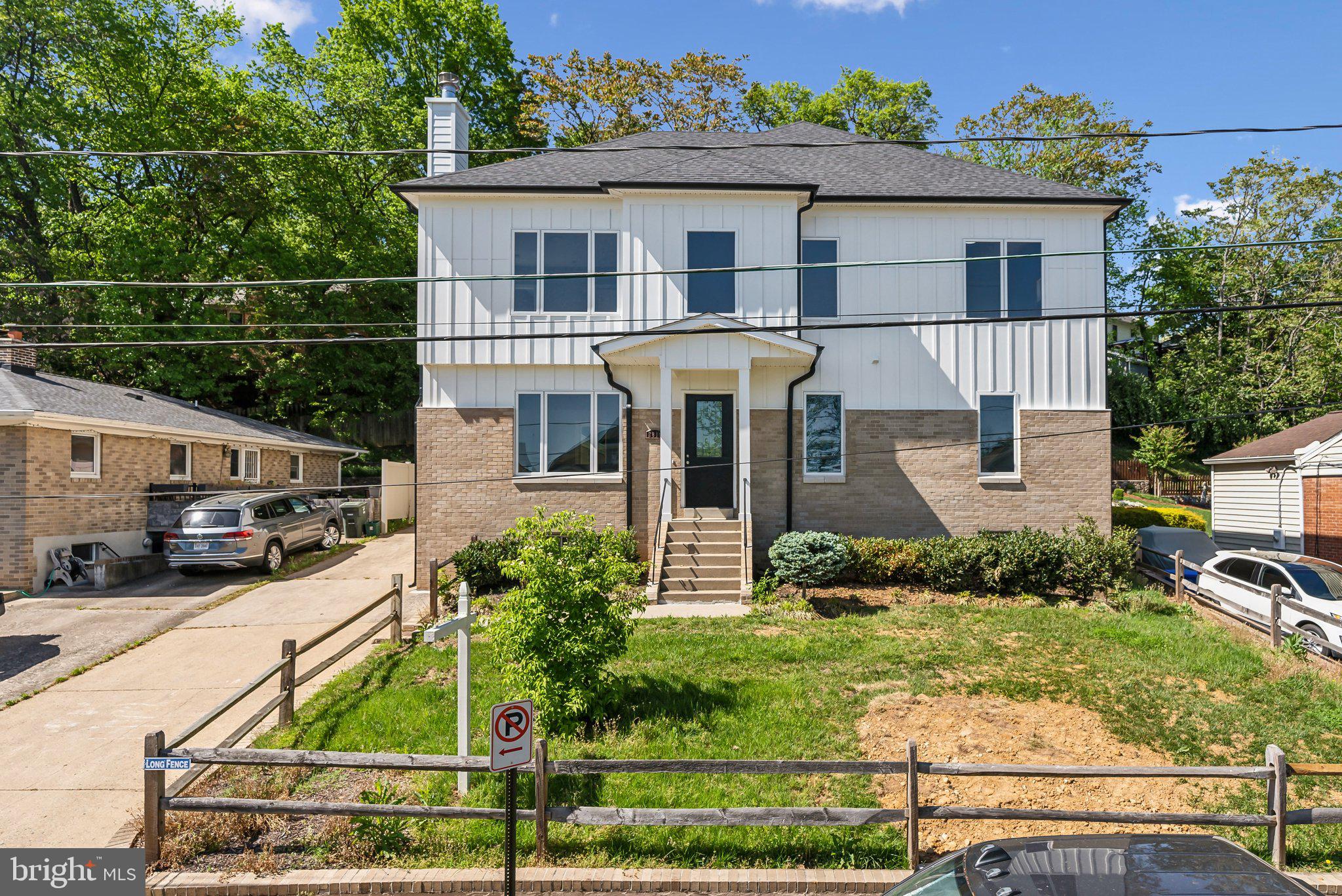 2811 21st Road South Arlington, VA 22206 - Photo 1 of 49 a front view of a house with a yard