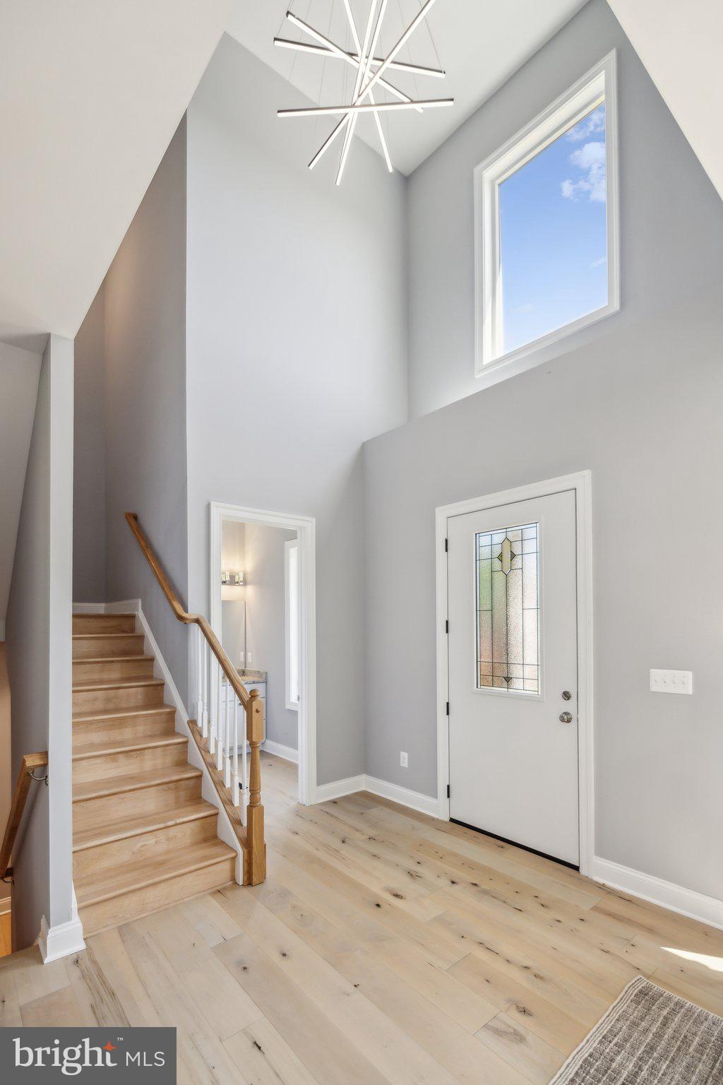 2811 21st Road South Arlington, VA 22206 - Photo 3 of 49 a view of a livingroom with wooden floor and staircase