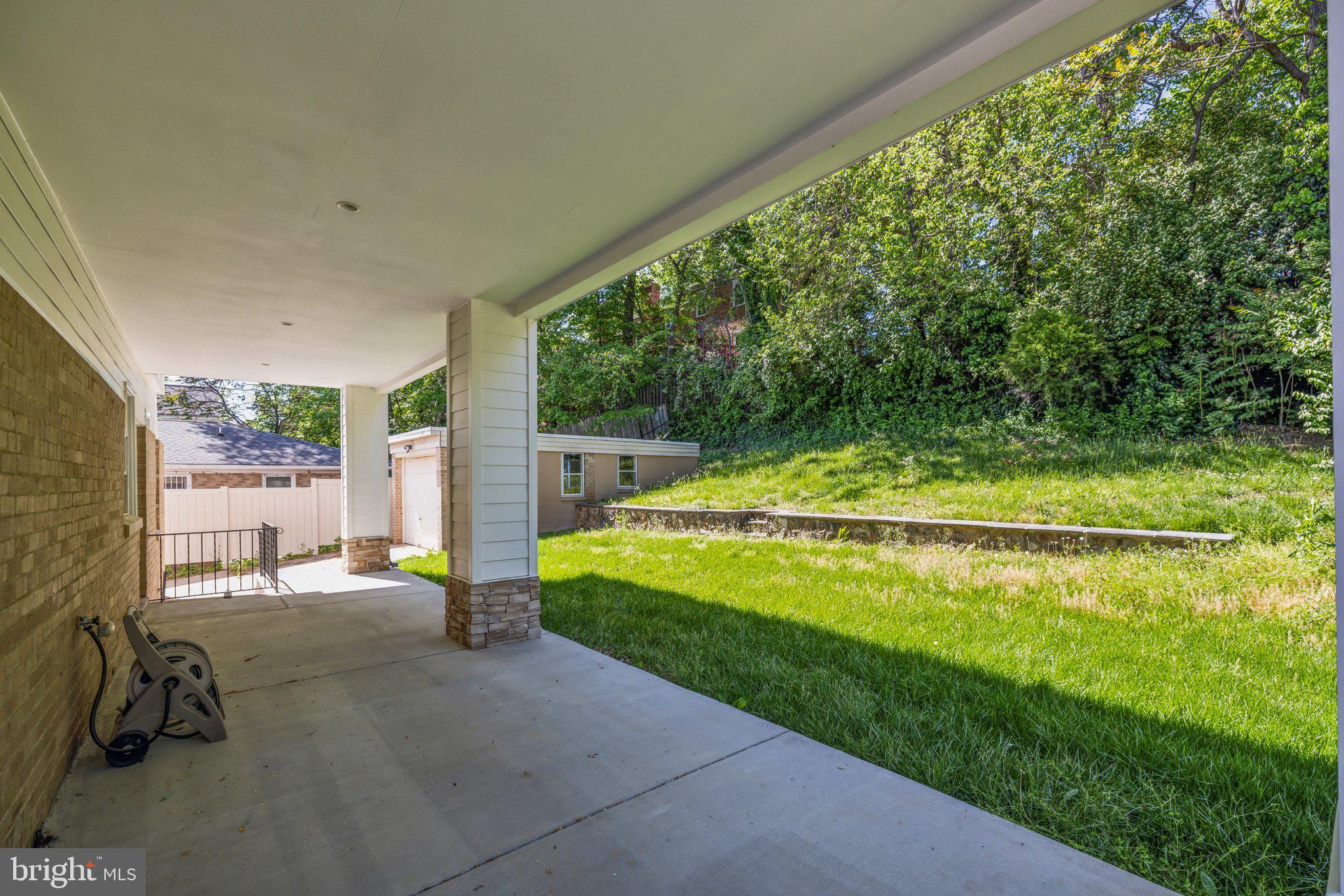 2811 21st Road South Arlington, VA 22206 - Photo 43 of 49 a view of a swimming pool with a patio and a backyard