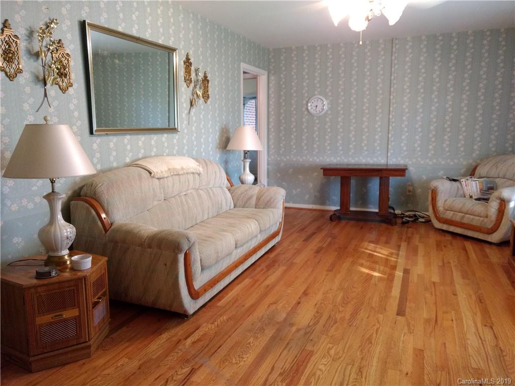 2703 Pearidge Road Bostic, NC 28018 - Photo 2 of 29 a bedroom with a bed and lamp