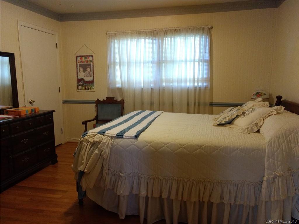 2703 Pearidge Road Bostic, NC 28018 - Photo 11 of 29 a bedroom with a bed and a dresser