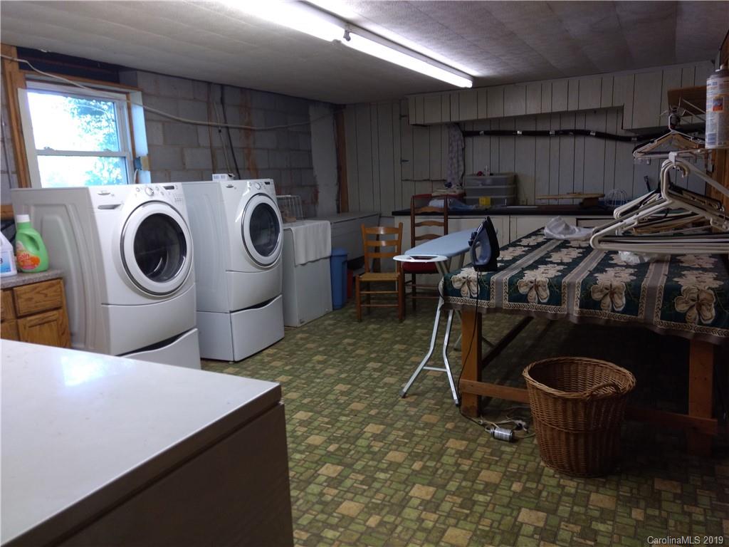 2703 Pearidge Road Bostic, NC 28018 - Photo 20 of 29 a utility room with dryer washer and a view of living room
