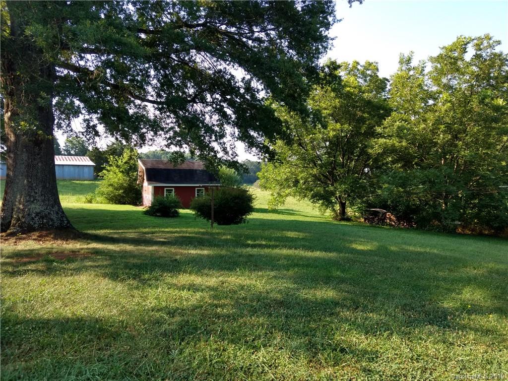 2703 Pearidge Road Bostic, NC 28018 - Photo 26 of 29 a front view of a house with a yard