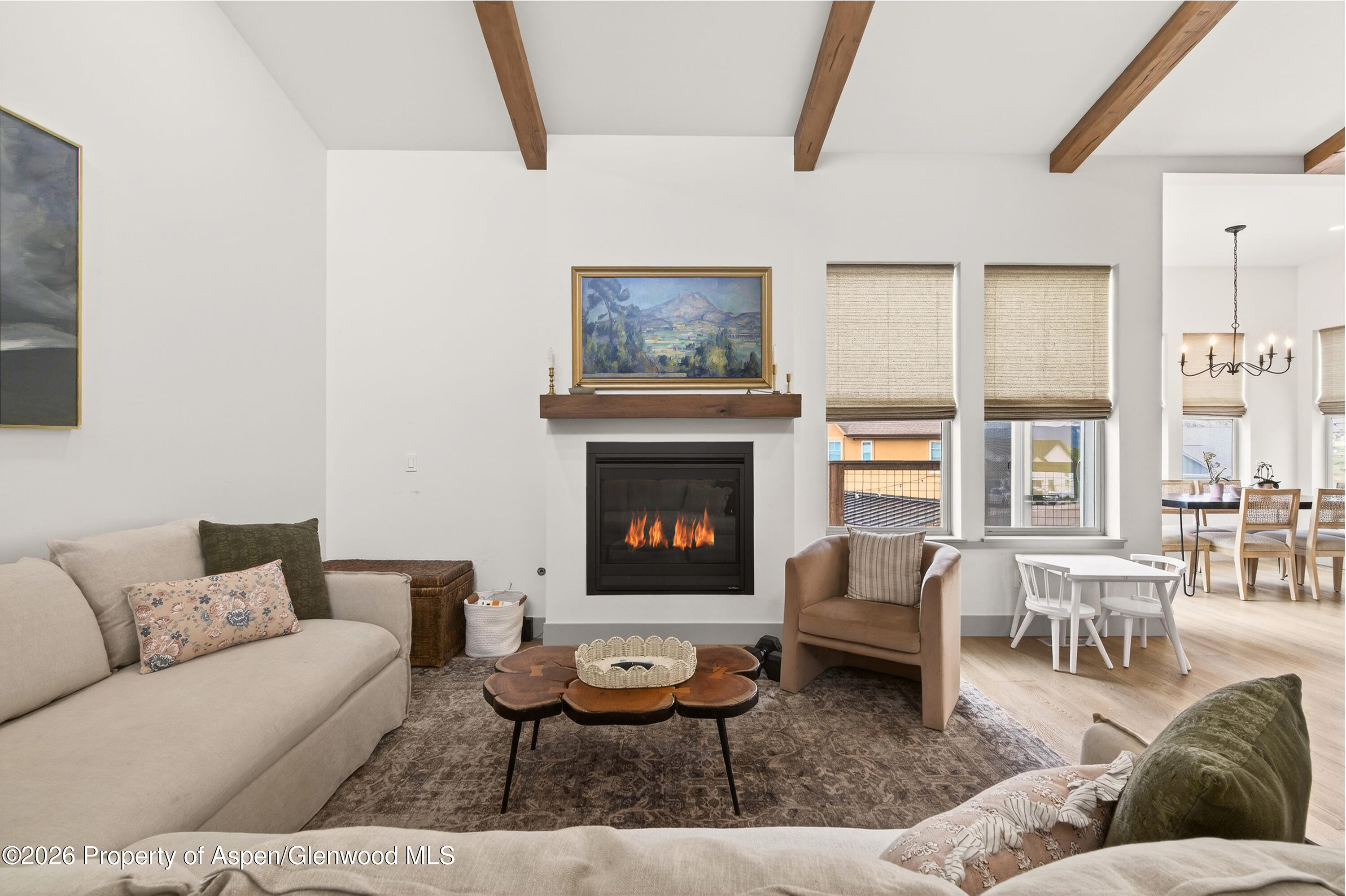1395 Rifle Heights Drive Rifle, CO 81650 - Photo 17 of 35 a living room with furniture and a fireplace