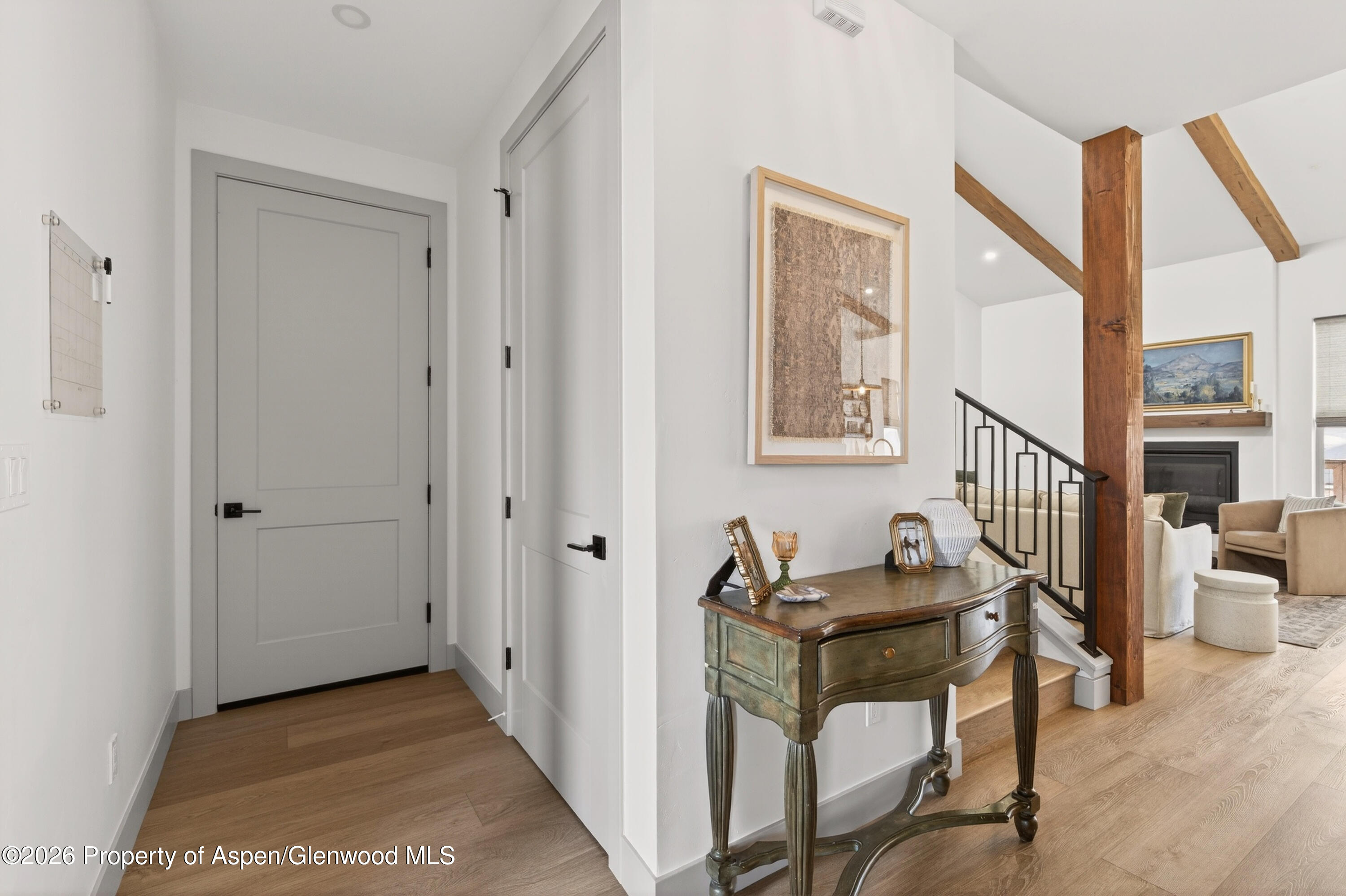 1395 Rifle Heights Drive Rifle, CO 81650 - Photo 6 of 35 a view of a livingroom with furniture and staircase