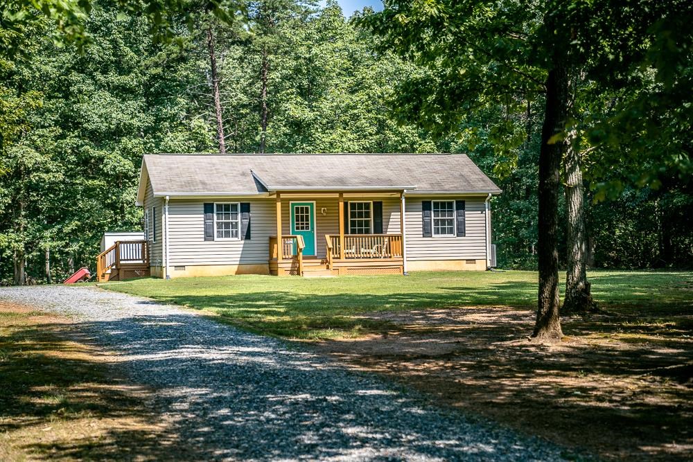 1139 Johnson Road Mineral, VA 23117 - Photo 1 of 33 a front view of a house with a garden