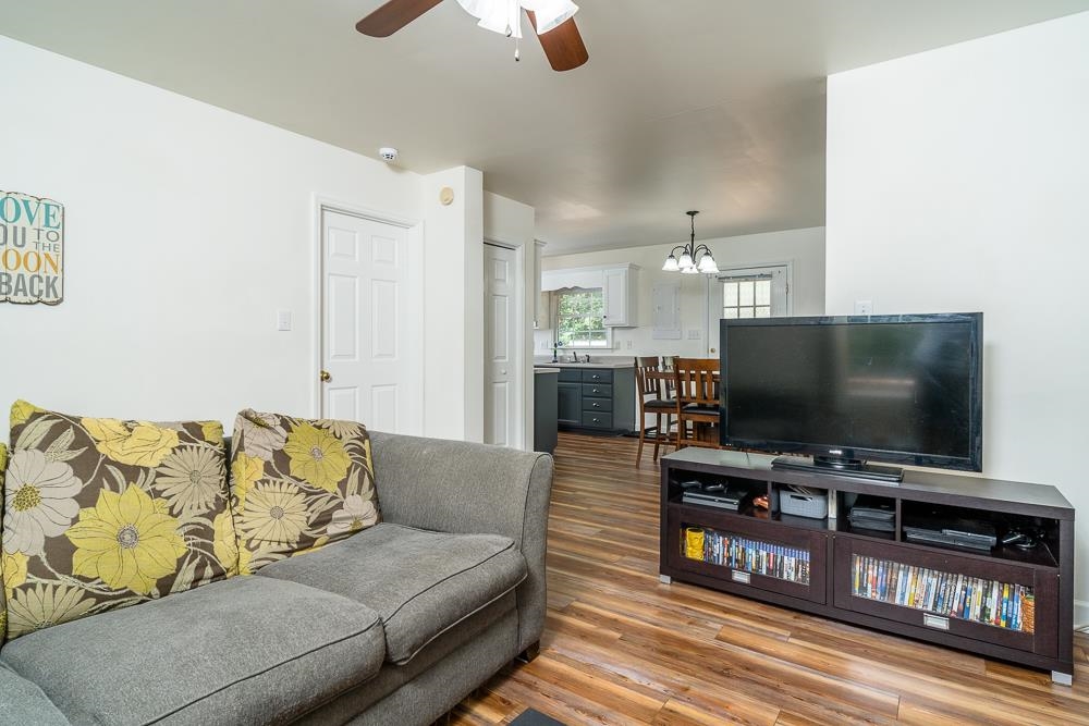 1139 Johnson Road Mineral, VA 23117 - Photo 11 of 33 a living room with furniture and a flat screen tv