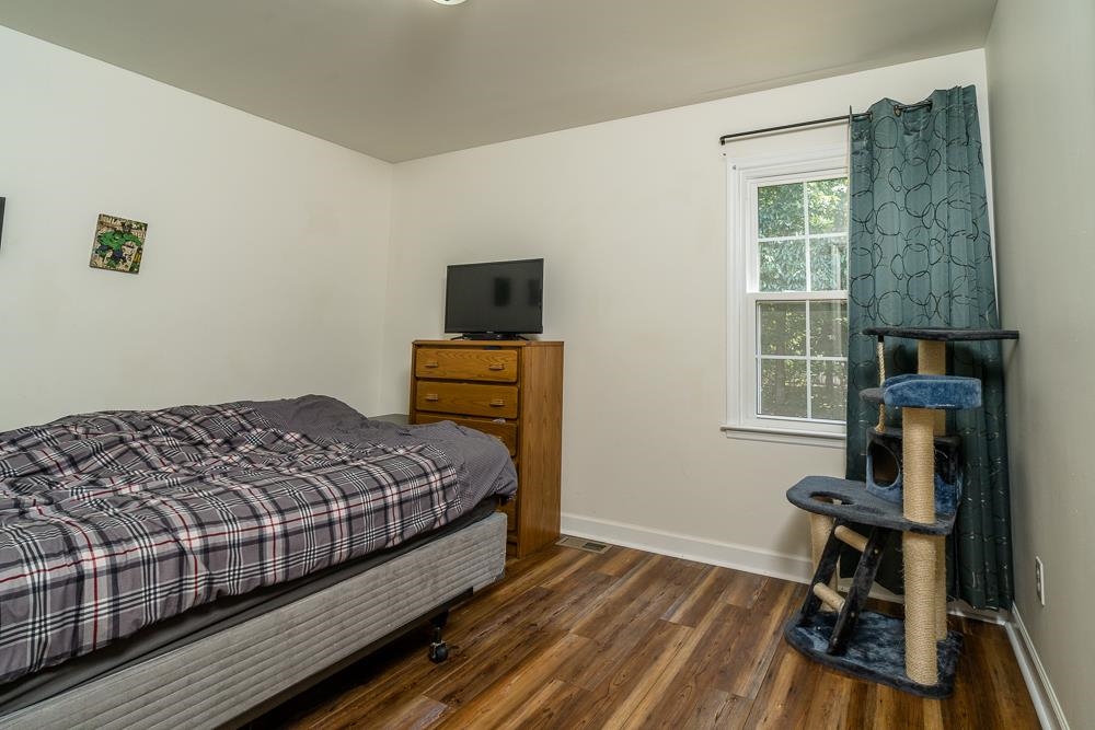 1139 Johnson Road Mineral, VA 23117 - Photo 14 of 33 a bedroom with a bed and a tv on table
