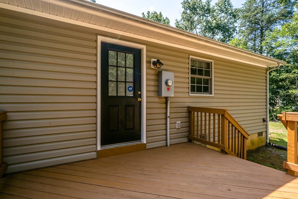 1139 Johnson Road Mineral, VA 23117 - Photo 29 of 33 a view of a house with a garage