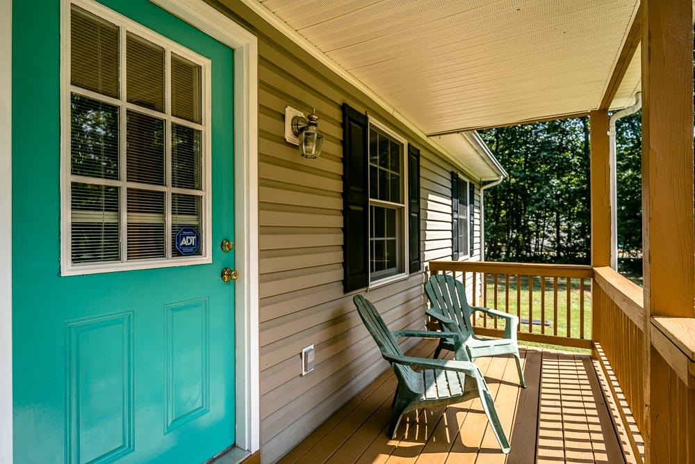 1139 Johnson Road Mineral, VA 23117 - Photo 3 of 33 a view of a chair and table in the balcony