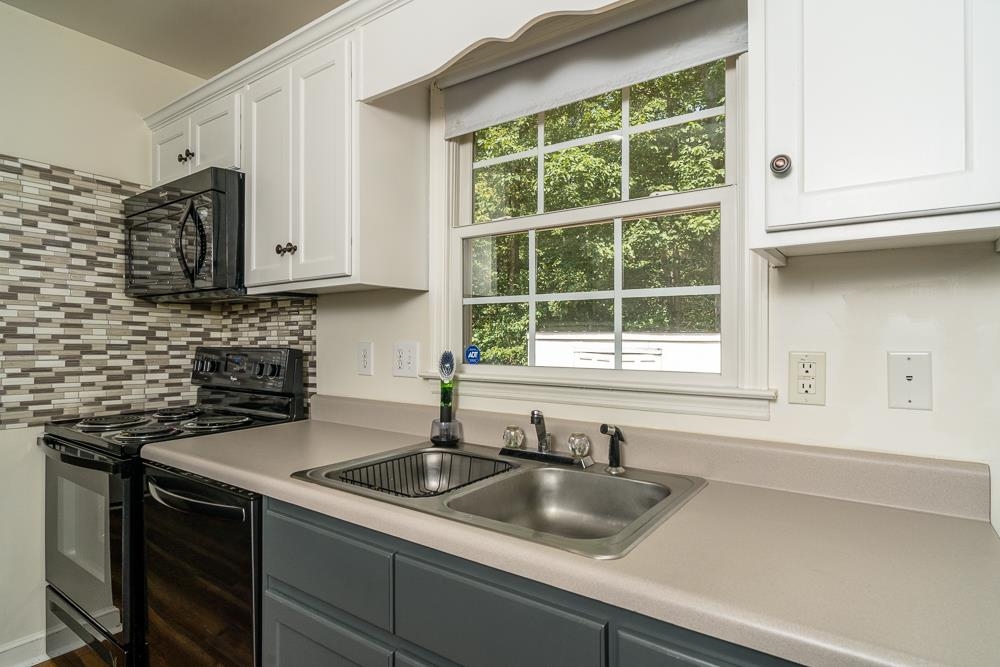 1139 Johnson Road Mineral, VA 23117 - Photo 5 of 33 a kitchen with a sink and a window