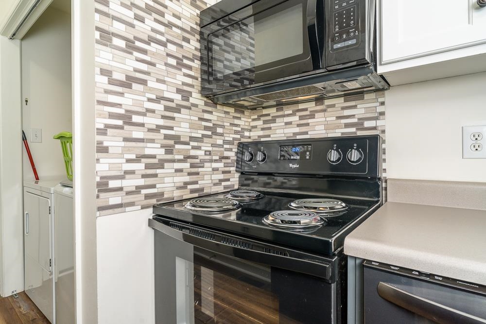 1139 Johnson Road Mineral, VA 23117 - Photo 6 of 33 a stove top oven sitting inside of a kitchen