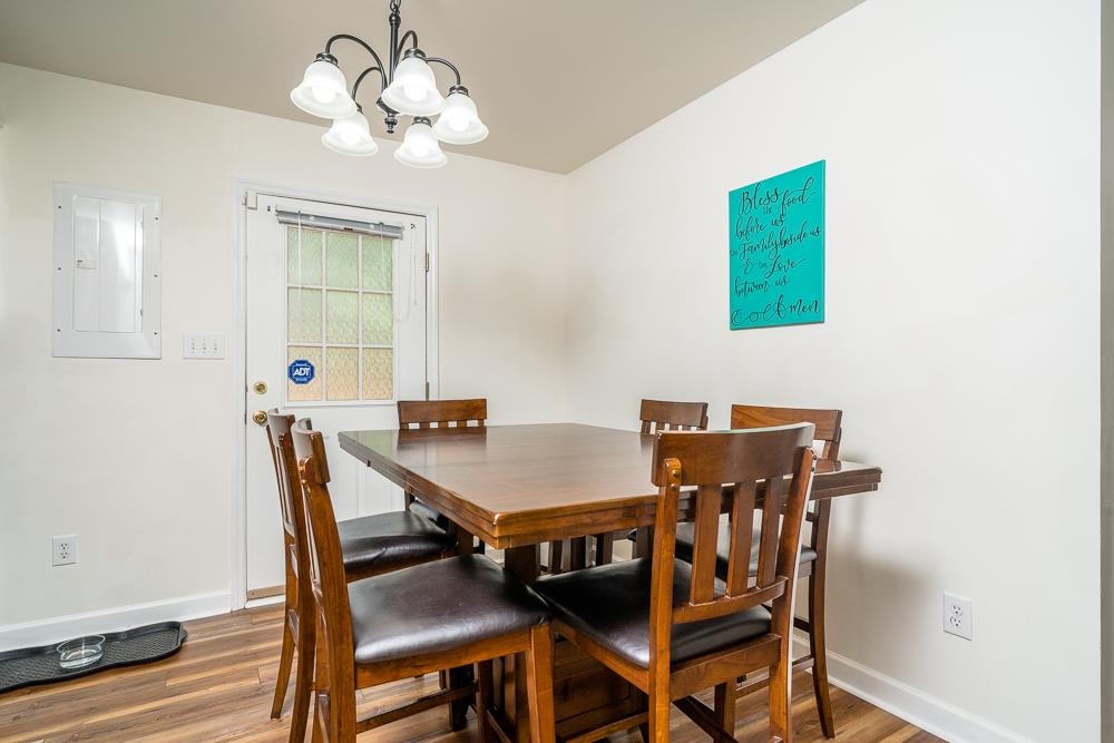 1139 Johnson Road Mineral, VA 23117 - Photo 8 of 33 a view of a dining room with furniture and wooden floor