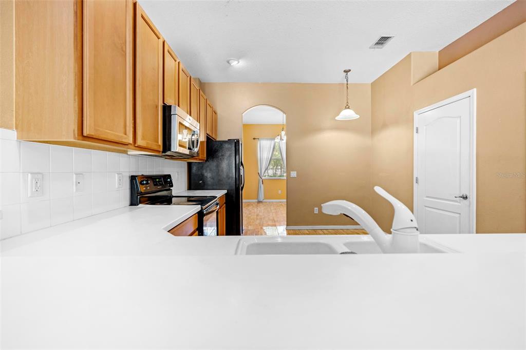 4211 Blakemore Place Spring Hill, FL 34609 - Photo 17 of 42 a very nice looking room with a large window