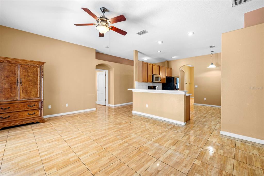 4211 Blakemore Place Spring Hill, FL 34609 - Photo 19 of 42 a view of a kitchen with a sink and cabinets
