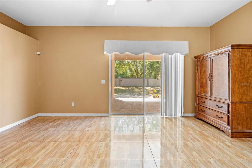 4211 Blakemore Place Spring Hill, FL 34609 - Photo 21 of 42 a view of an empty room with a window