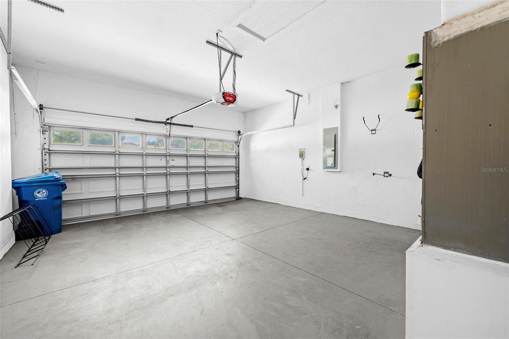 4211 Blakemore Place Spring Hill, FL 34609 - Photo 37 of 42 a view of a garage with storage
