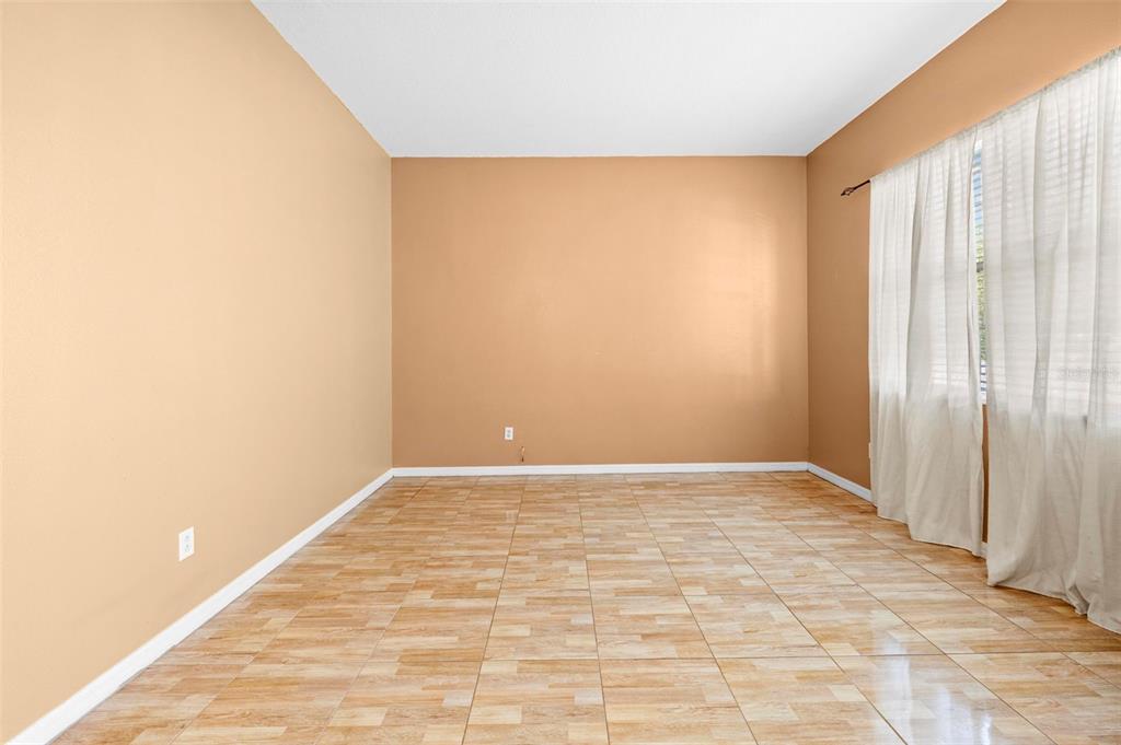 4211 Blakemore Place Spring Hill, FL 34609 - Photo 4 of 42 a view of an empty room and window
