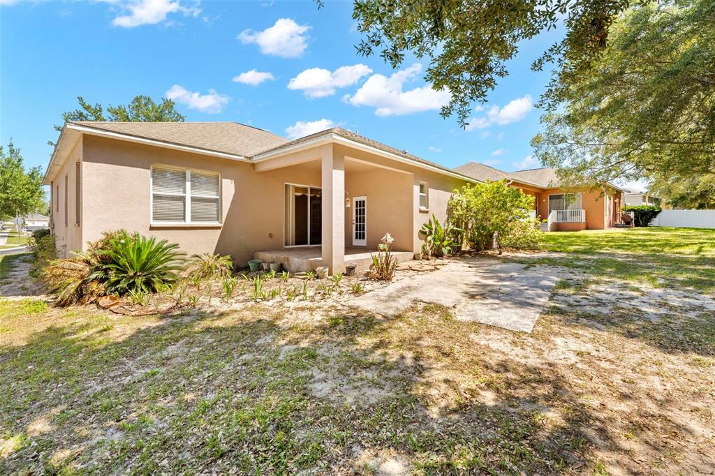 4211 Blakemore Place Spring Hill, FL 34609 - Photo 41 of 42 a front view of house with yard