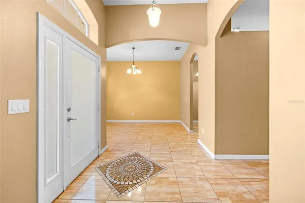 a bathroom with a glass door shower