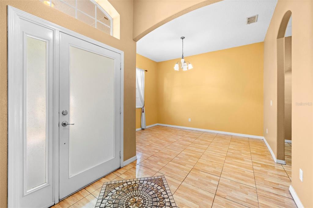 4211 Blakemore Place Spring Hill, FL 34609 - Photo 8 of 42 a view of an empty room with a window