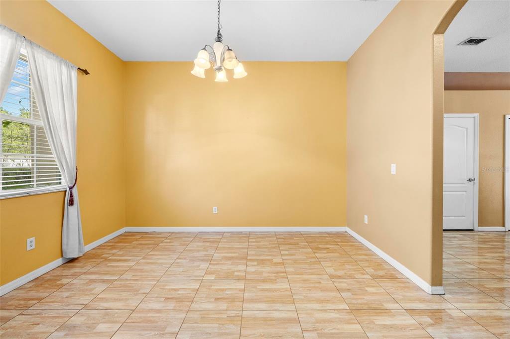 4211 Blakemore Place Spring Hill, FL 34609 - Photo 9 of 42 a view of livingroom with window