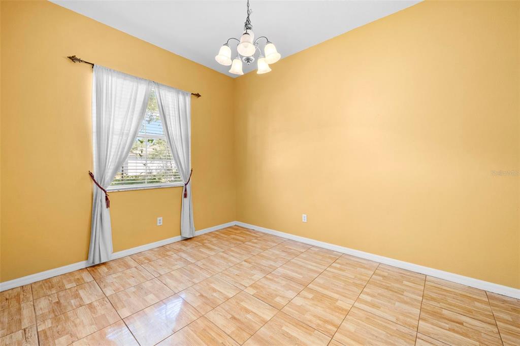 4211 Blakemore Place Spring Hill, FL 34609 - Photo 10 of 42 a view of an empty room with window
