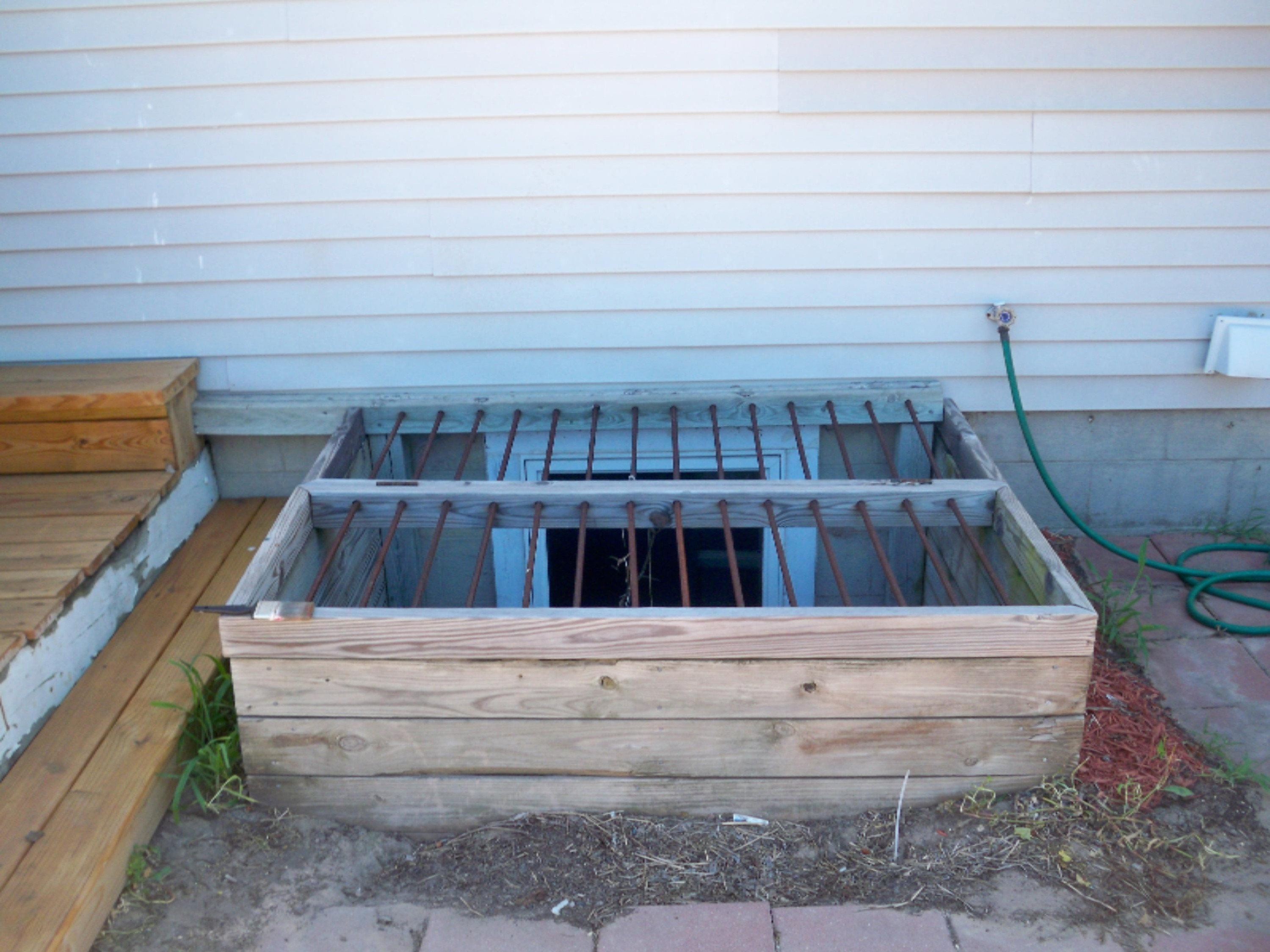 1675 South Darr Road Scottville, MI 49454 - Photo 23 of 31 cover for egress window